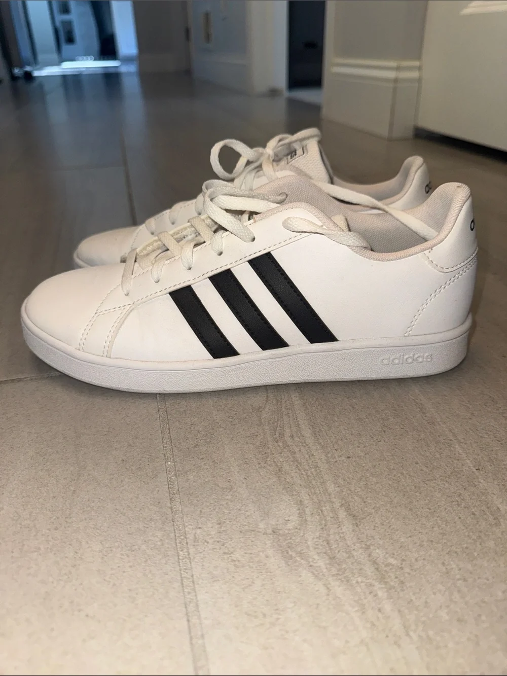 adidas White Low-Top Sneakers with Black Stripes
